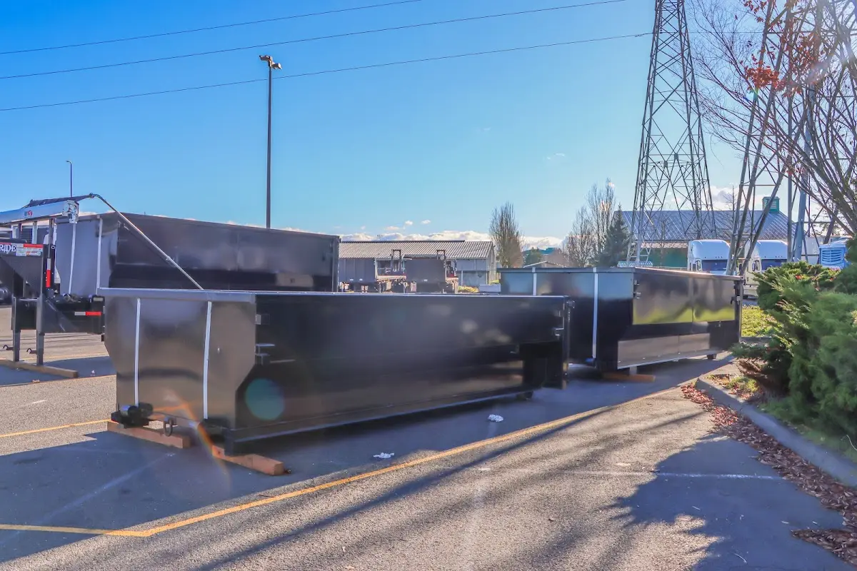 Roll-off dumpster ready for waste disposal at job site for 3 Yard Dumpster Rental in Jefferson